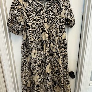 Elegant Black and Cream Floral Dress